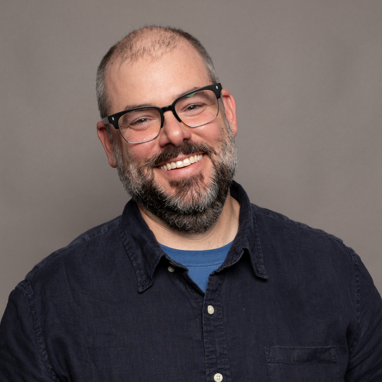 A headshot photo of Nathan Fox, Photo credit MJ O'Toole 2023