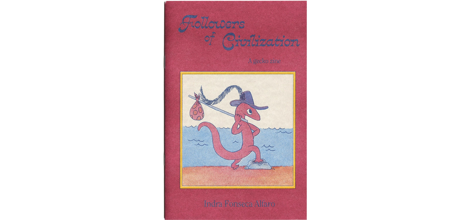 Cover of a zine showing a gecko with a wide brimmed explorer hat with a feather, its paw resting on a rock in front of the sea.