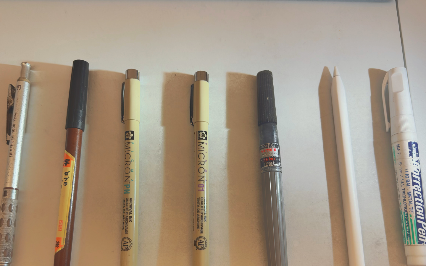 It's a photo of 7 pens.